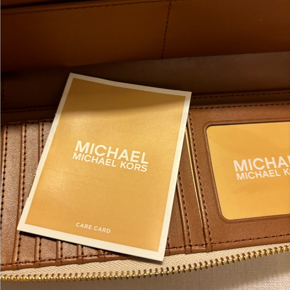 Cream colored Michael Kors wallet, brand new